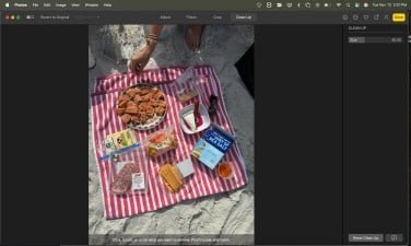 photo of a beach picnic with sneakers removed, but some artifacts remaining